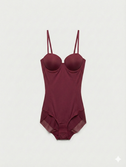 Maroon swimsuit with thin straps on a light gray background