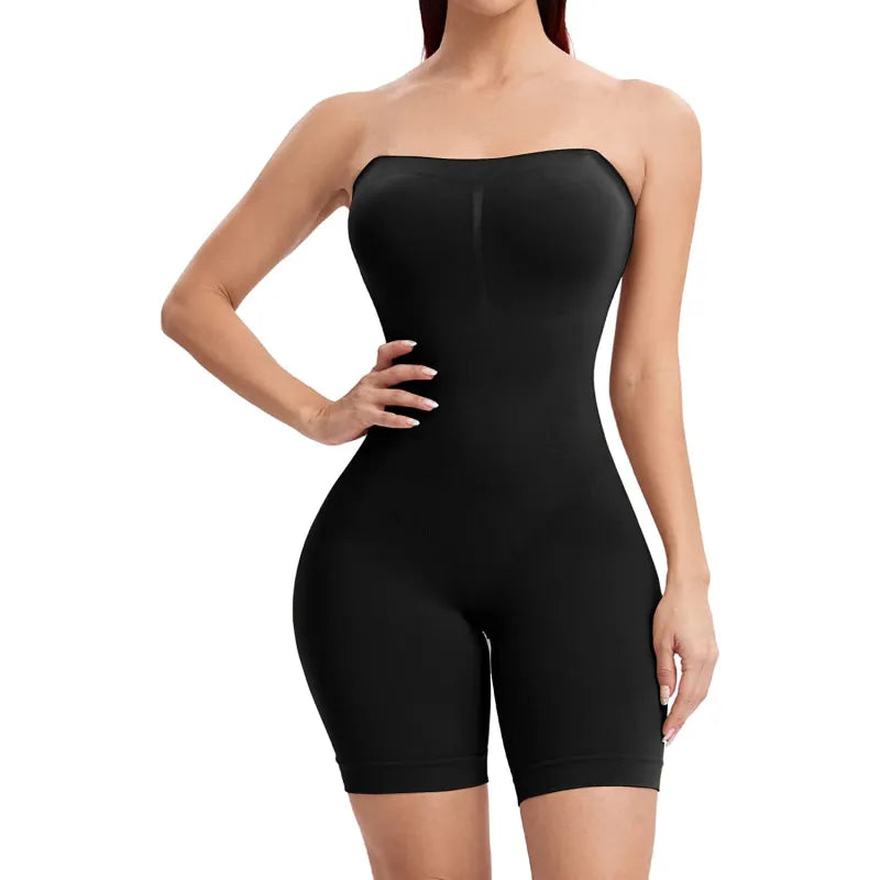 Black strapless bodysuit worn by a model on a white background